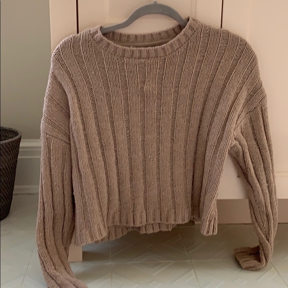 Scoop-neck sweater.
